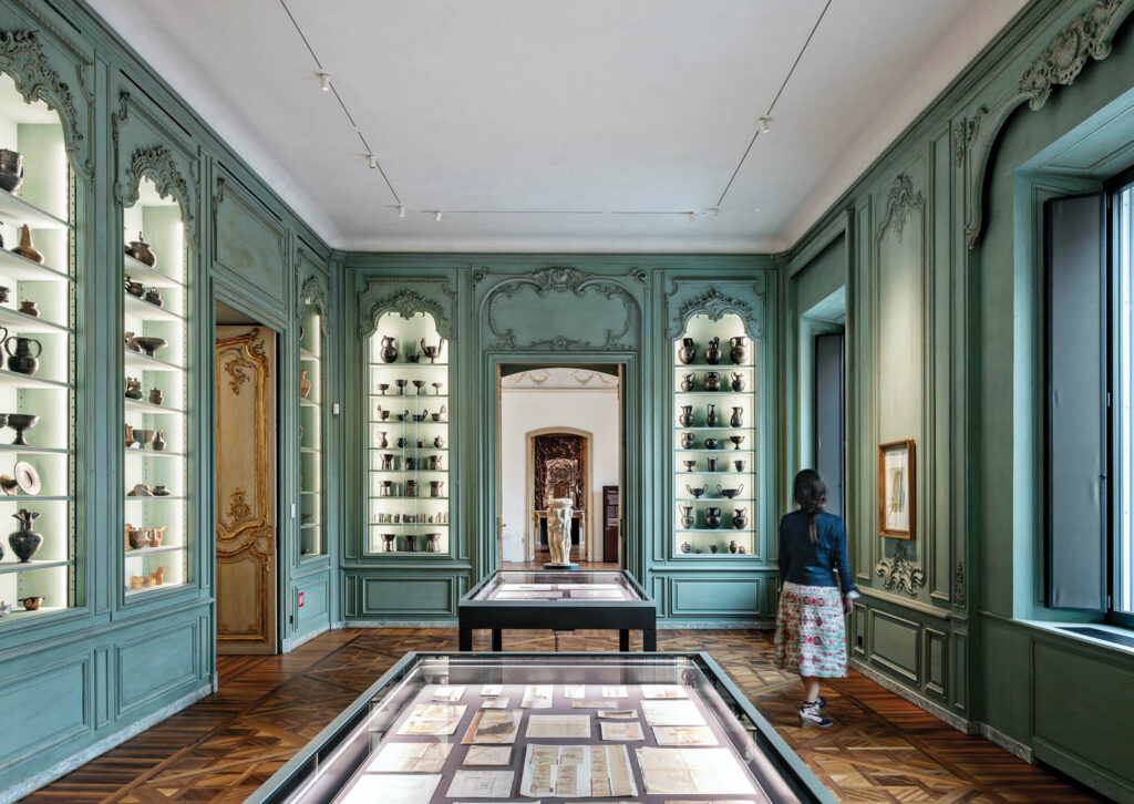 a gallery room showcases Estrucan ceramics